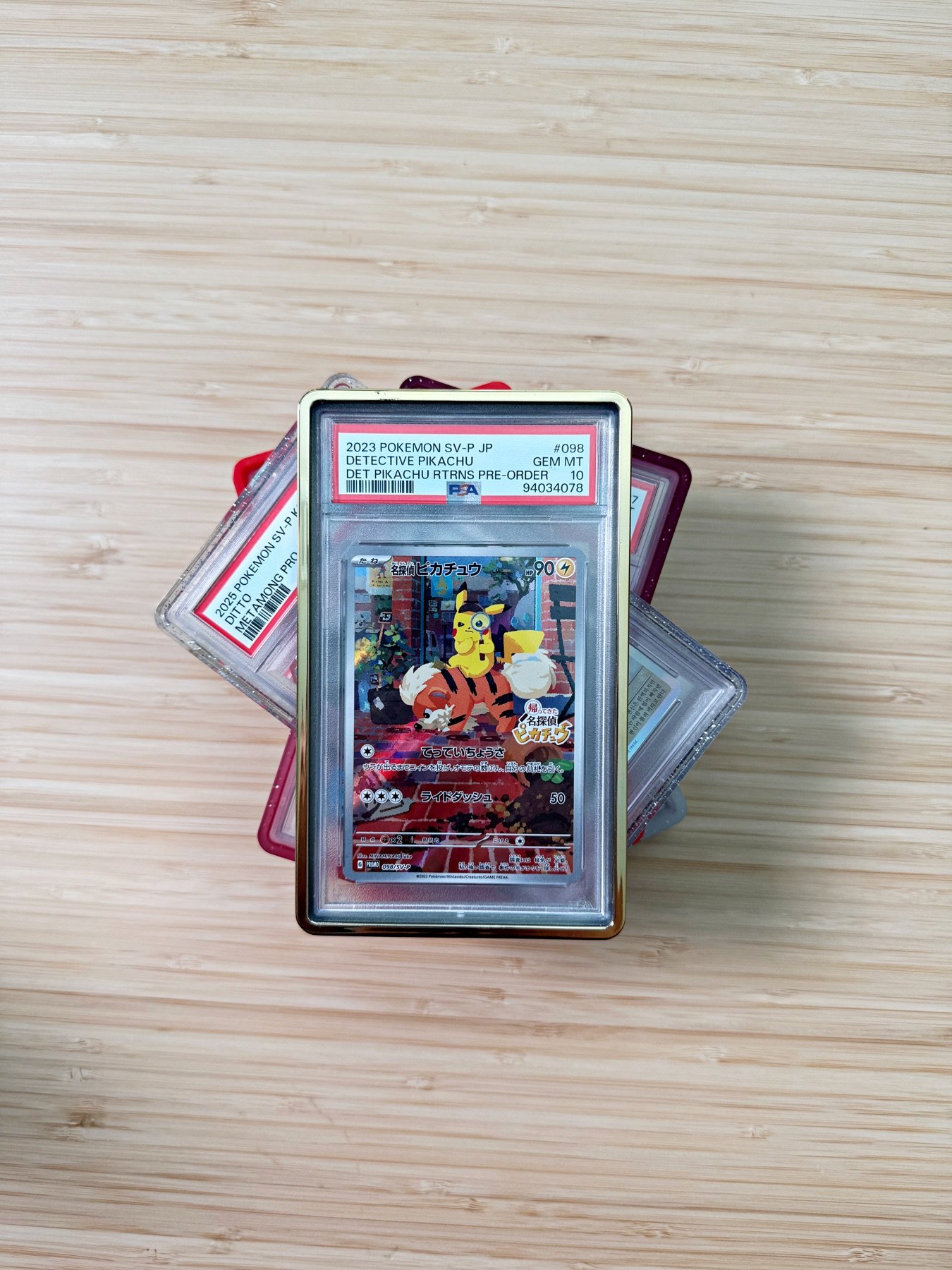 Graded Pokémon cards from the 21 Trading setup